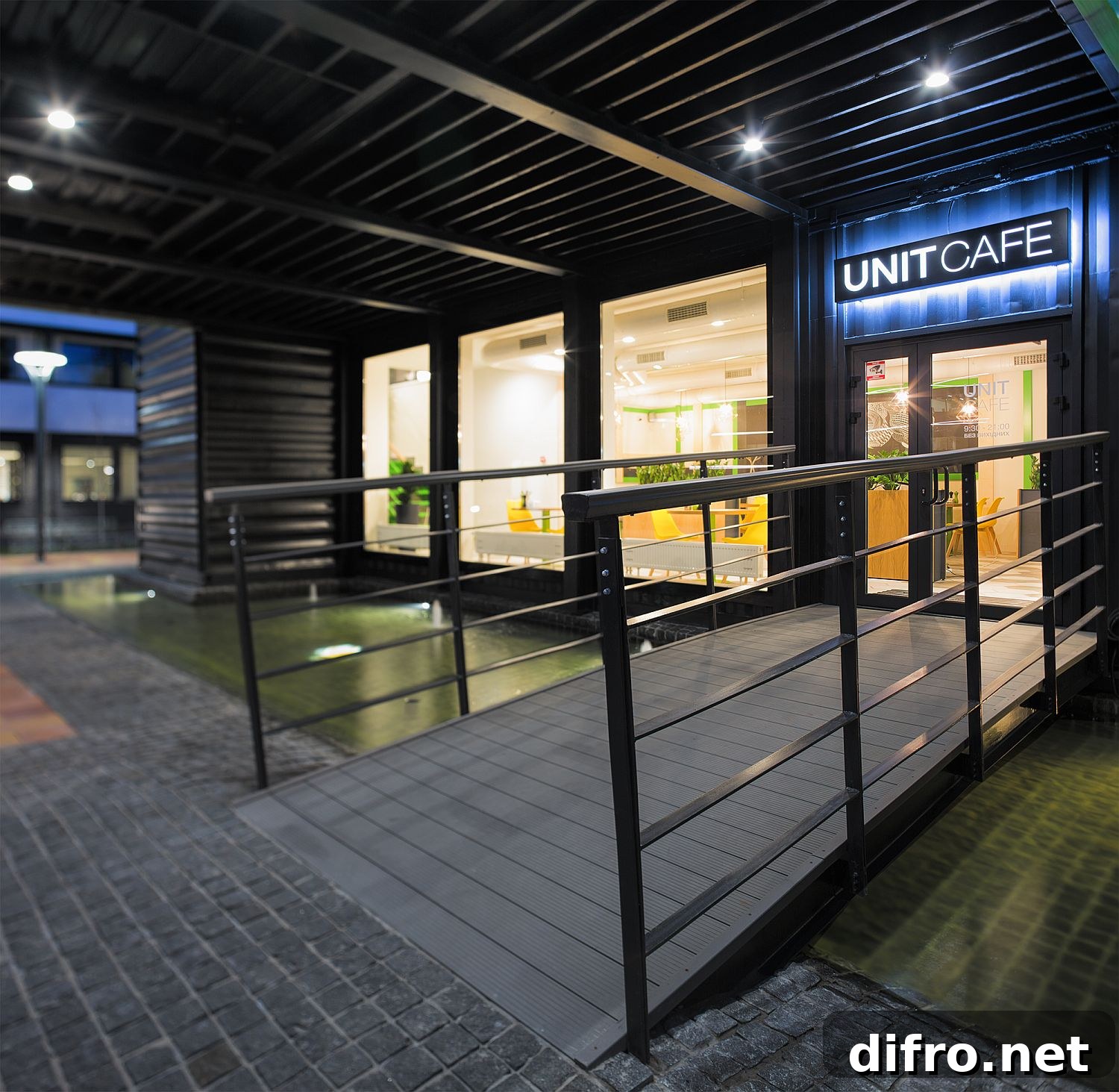Bridge-style entrance to café over a pond