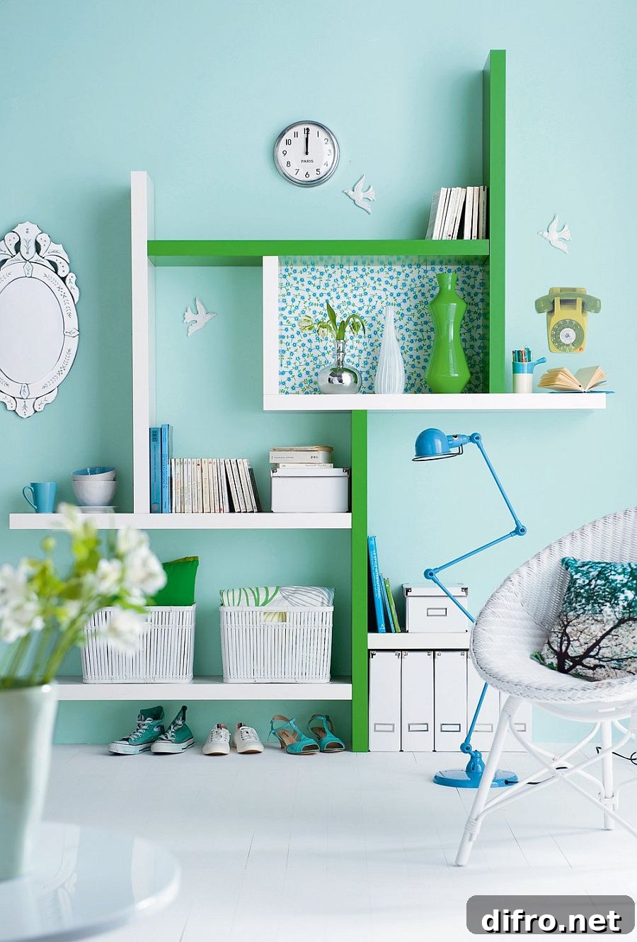 Colorful home office in pastel blue with pops of green