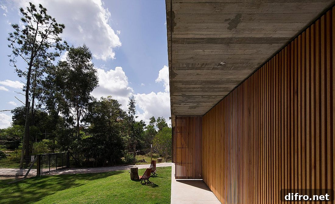Wall with wooden slats and doors lets filtered light to come through