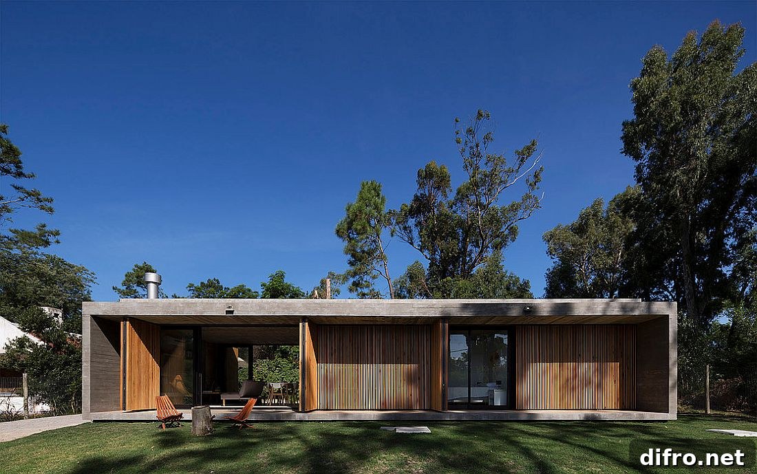 Exquisite modern home in Montevideo with movable doors that feature wooden slats