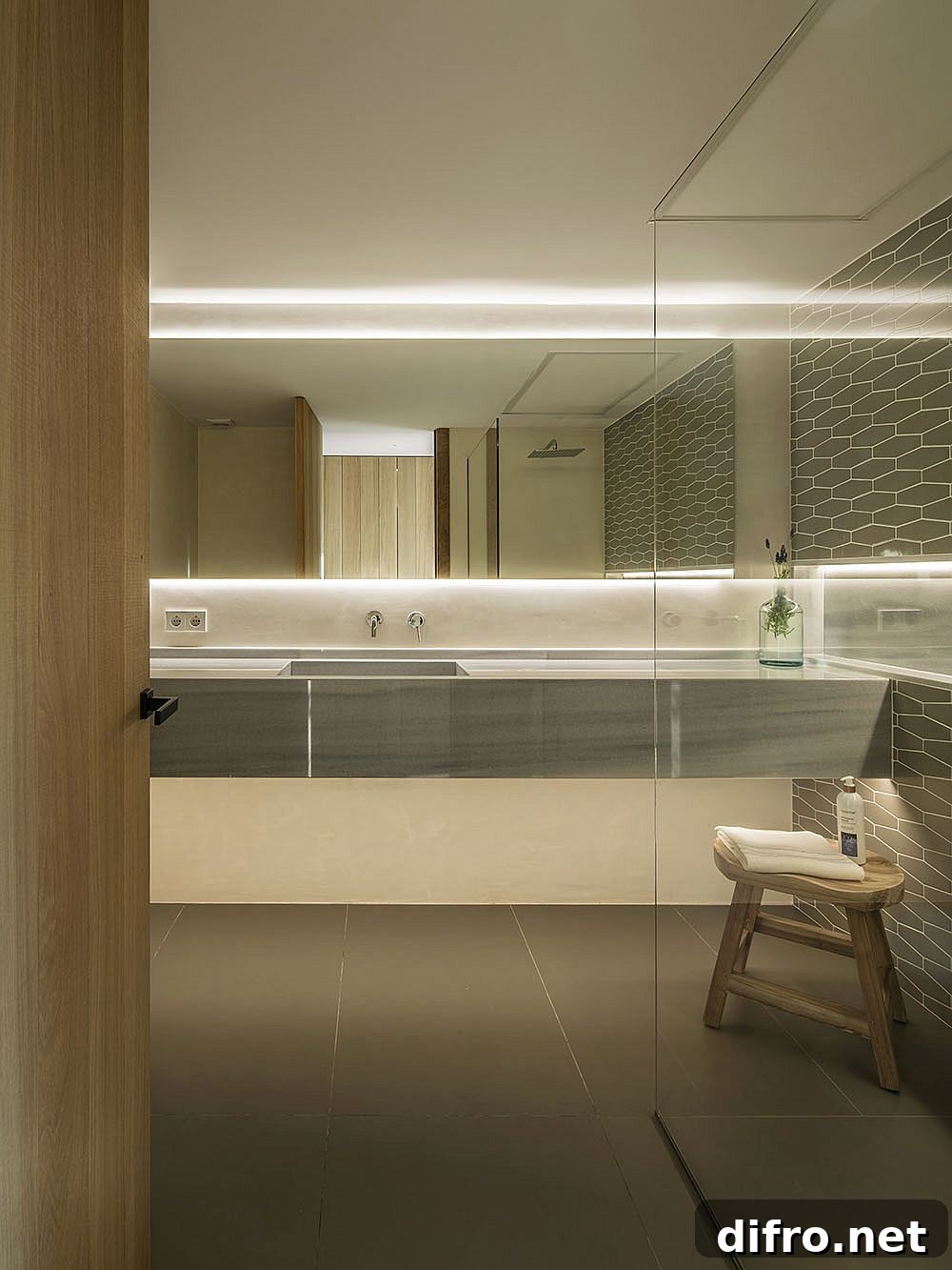 Backlit glass in a contemporary gray-and-white bathroom