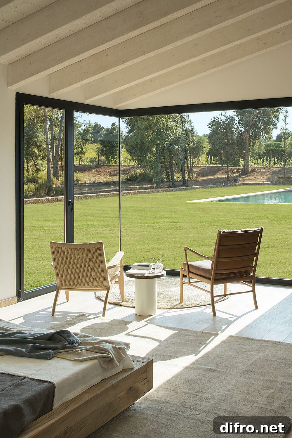 Sitting nook with a view of the garden and pool