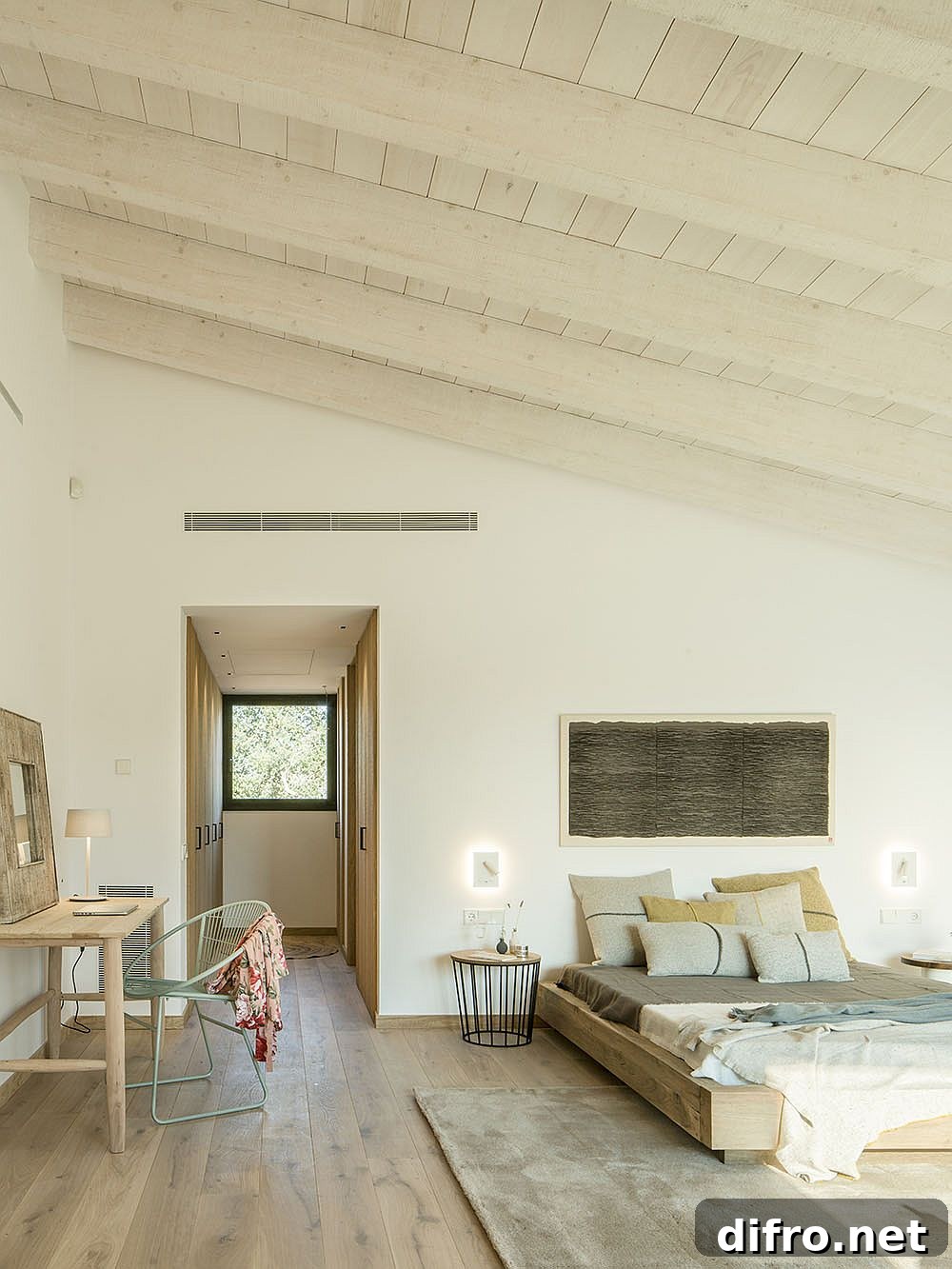 Bedroom with sloped ceiling and wooden details