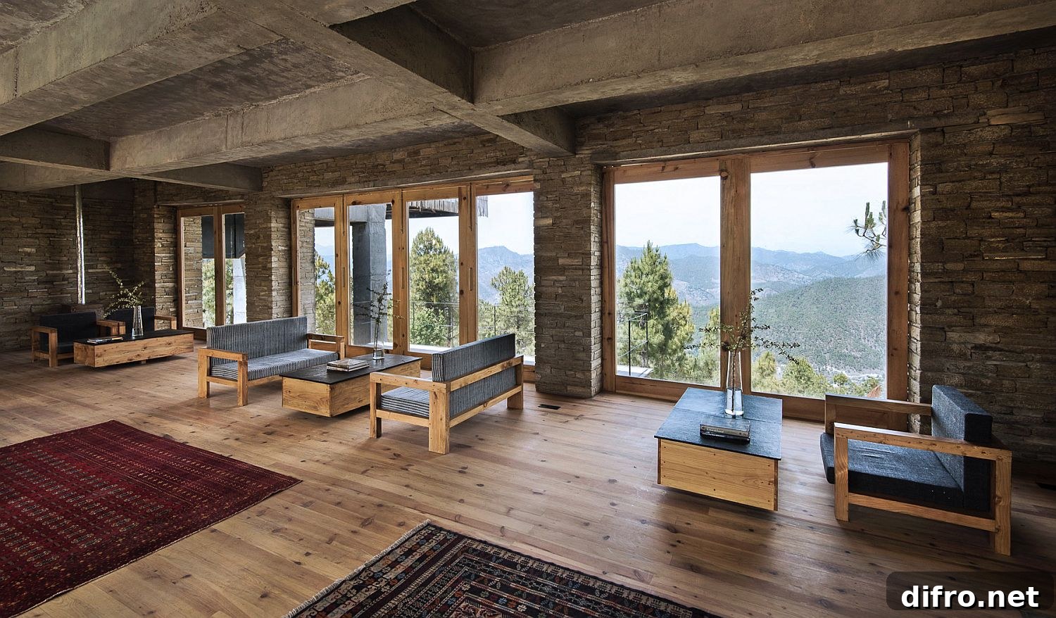 Common area at The Kumaon featuring exposed concrete and local materials