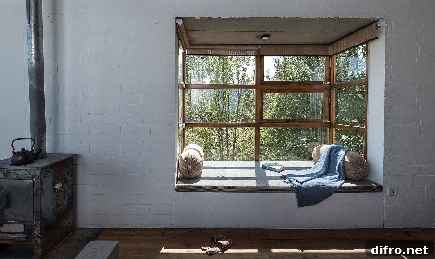 Window seat at The Kumaon framing Himalayan peaks