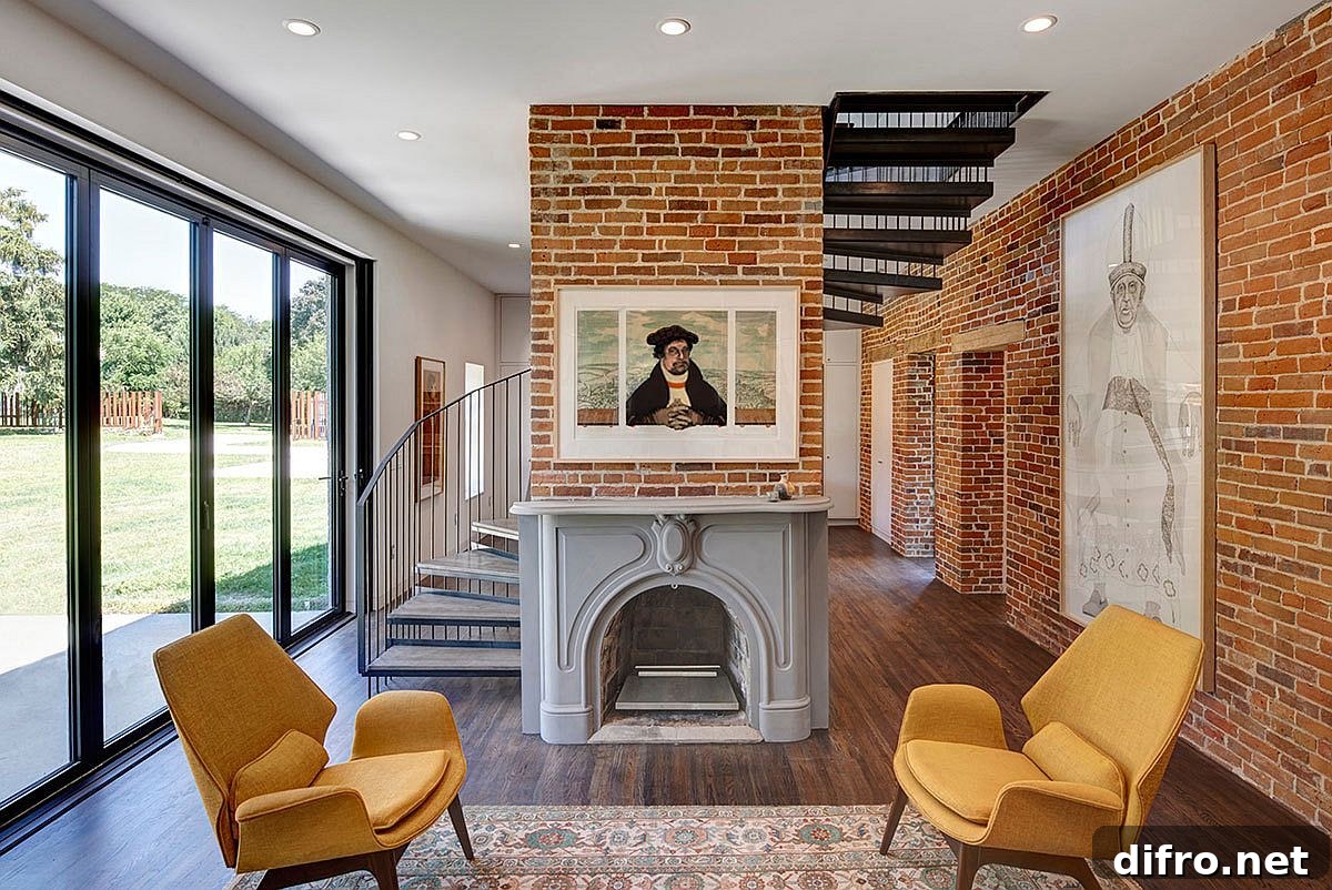 Exposed brick walls and a spiral stairway shape the new interior