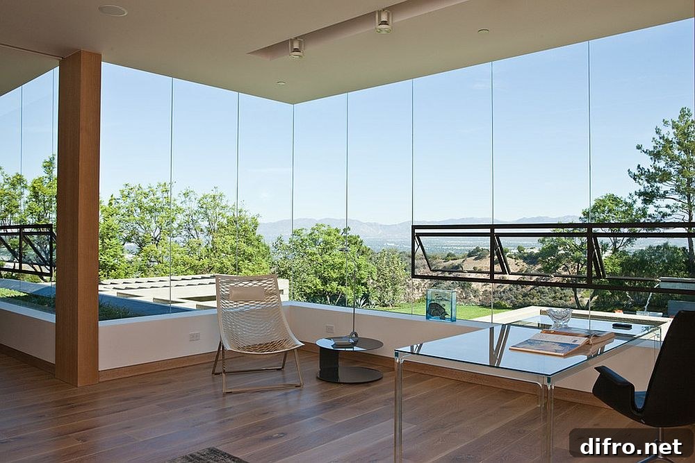 Contemporary home office with sweeping landscape views