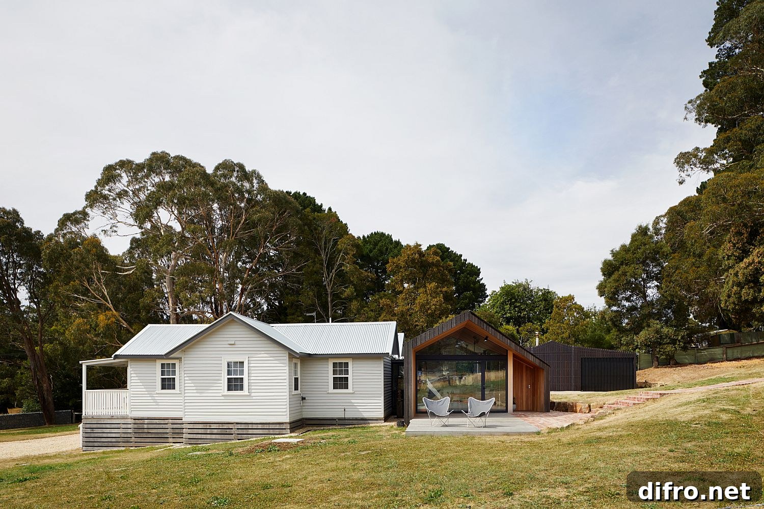 Modern extension beside Victorian house