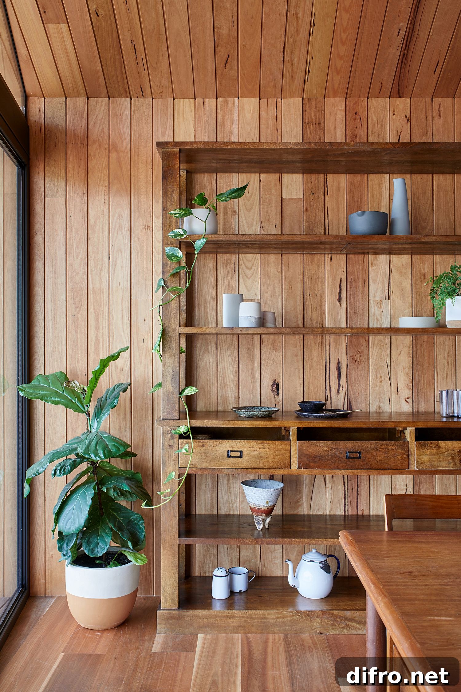 Greenery and timber create a cozy modern appeal