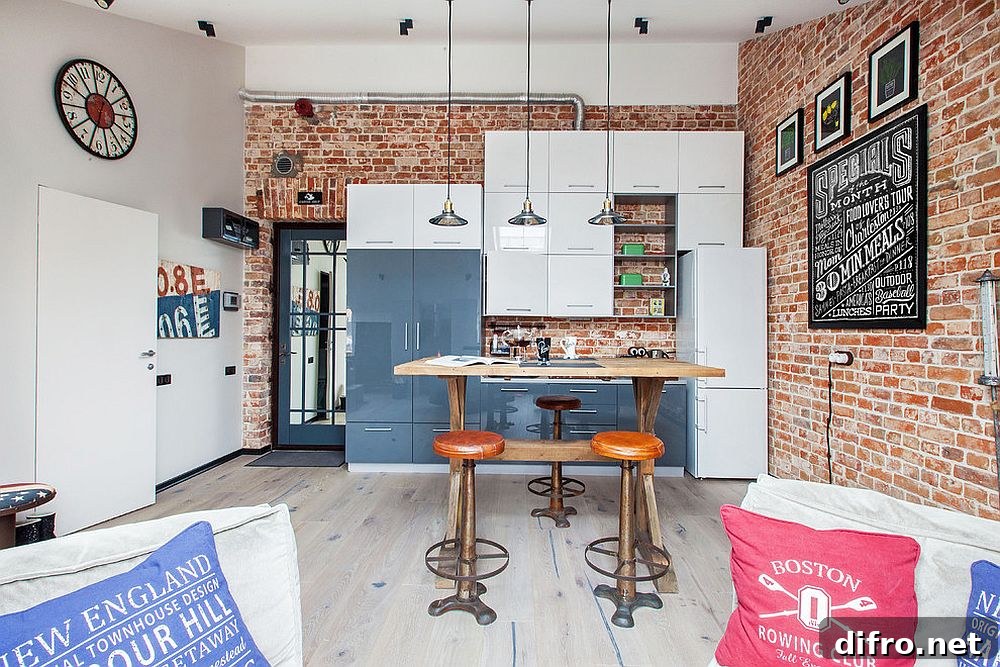 Industrial chic kitchen with a brick wall backdrop inside the small Moscow loft apartment