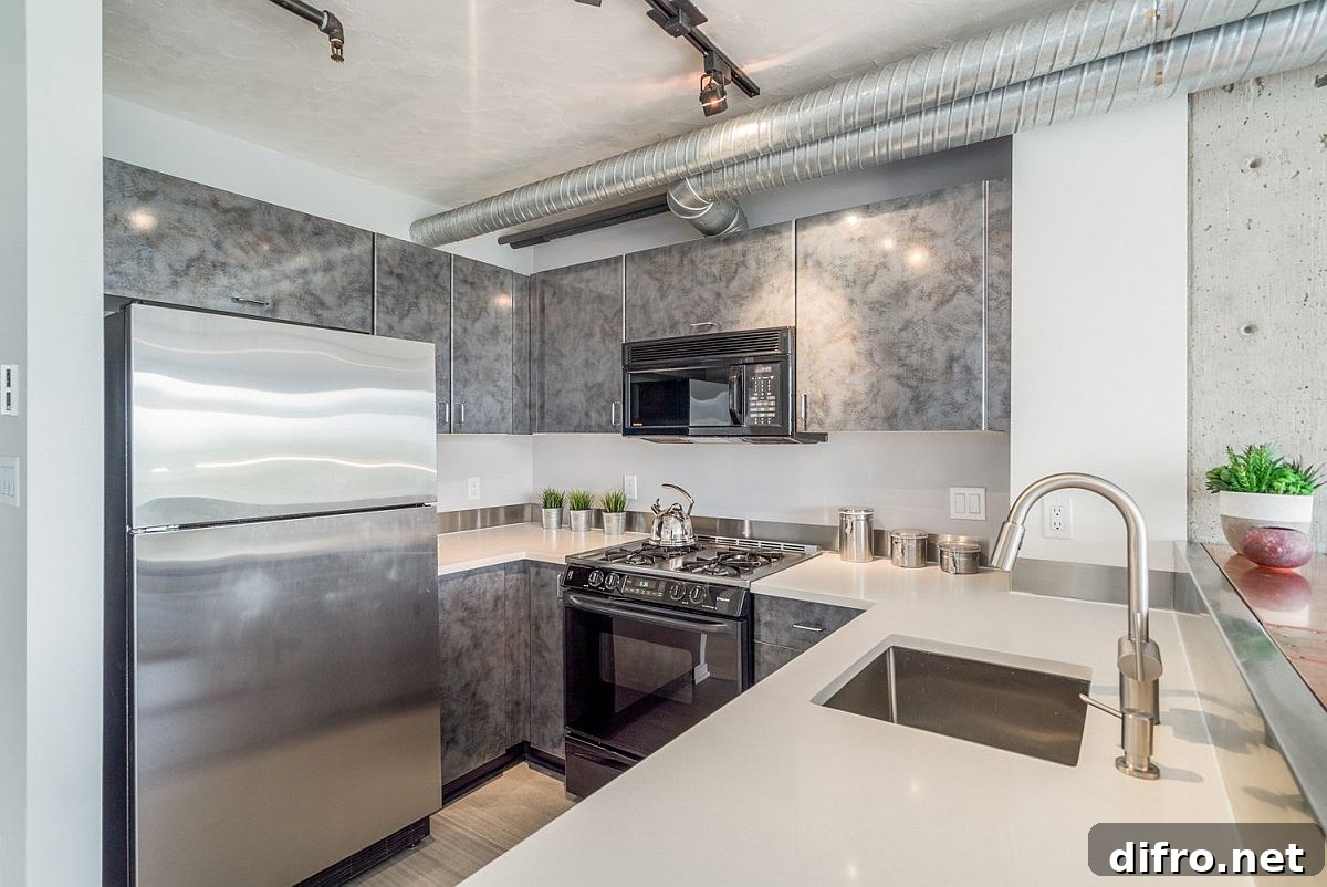 Kitchen peninsula turns the tiny kitchen into a cozy social space as well!