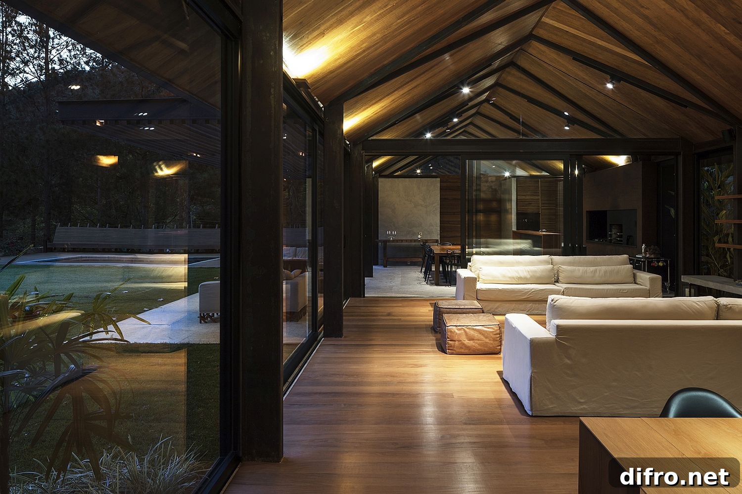 Floor-to-ceiling glass walls and sliding doors