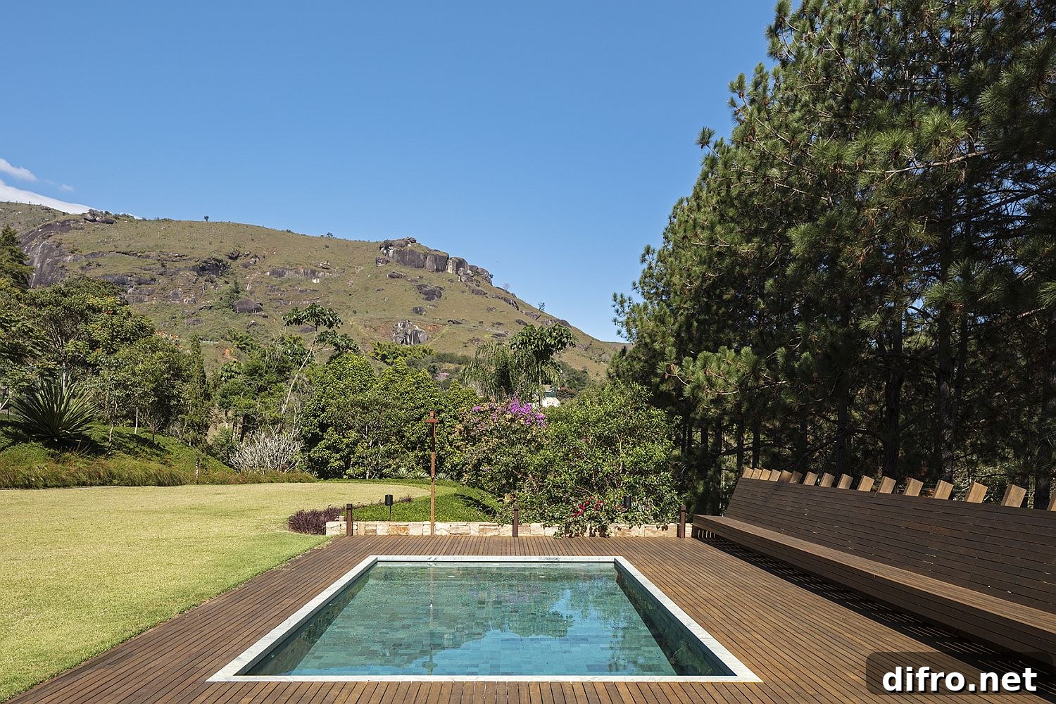 Pool with Hijau stone and wooden deck