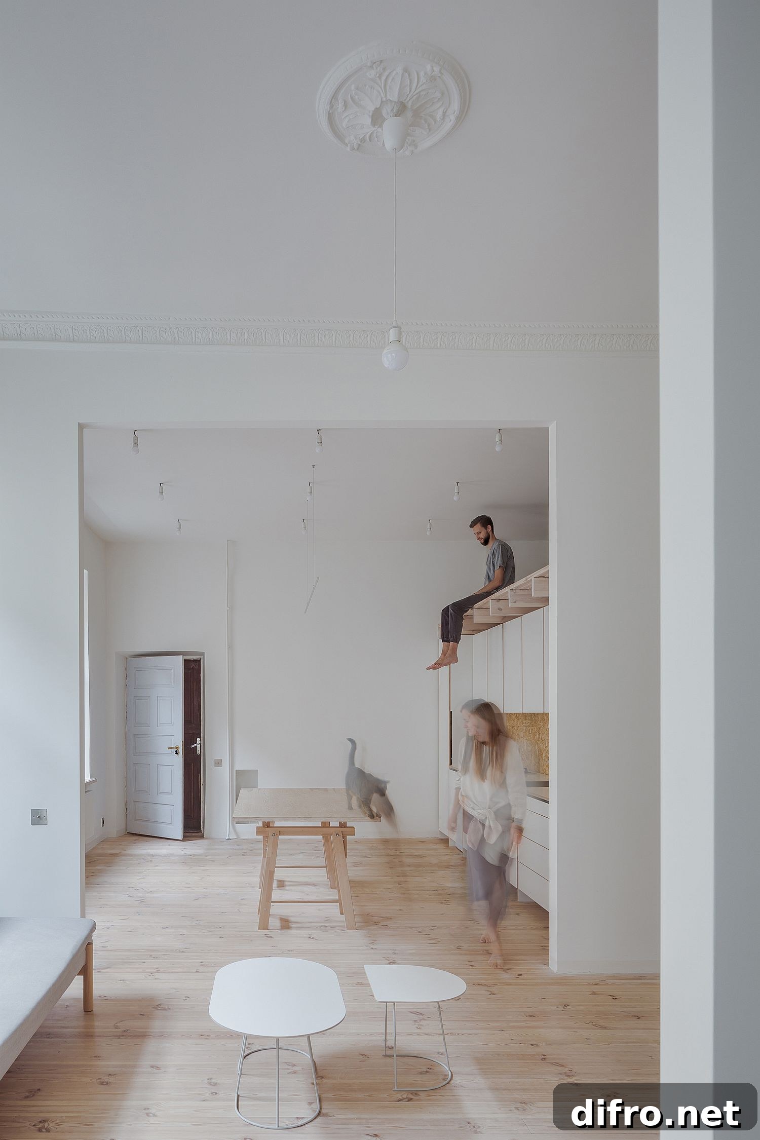 Interior marries vintage features with a minimal white backdrop