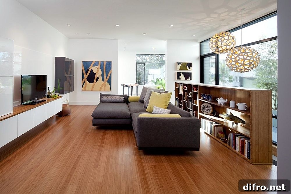 Dark gray sectional anchors a modern eclectic family room