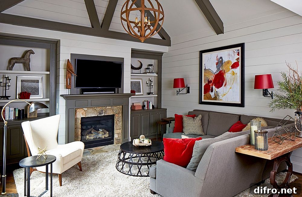 Living room with gray sofa and red accents