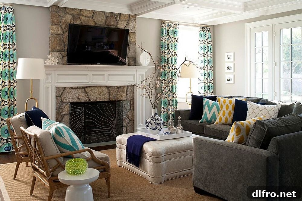 Beach-style living room with gray sofas and colorful pillows