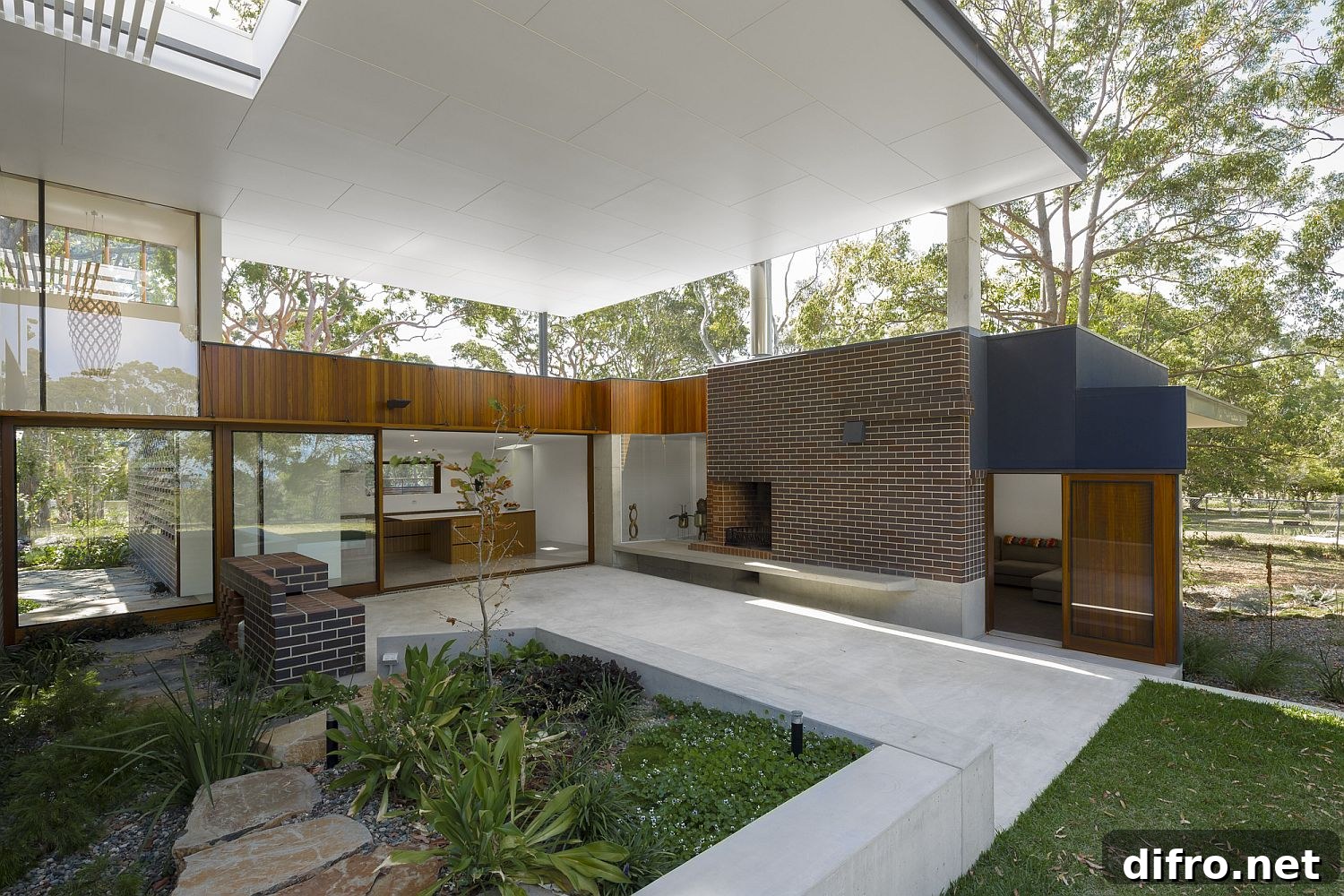 Covered exterior spaces flow into landscape