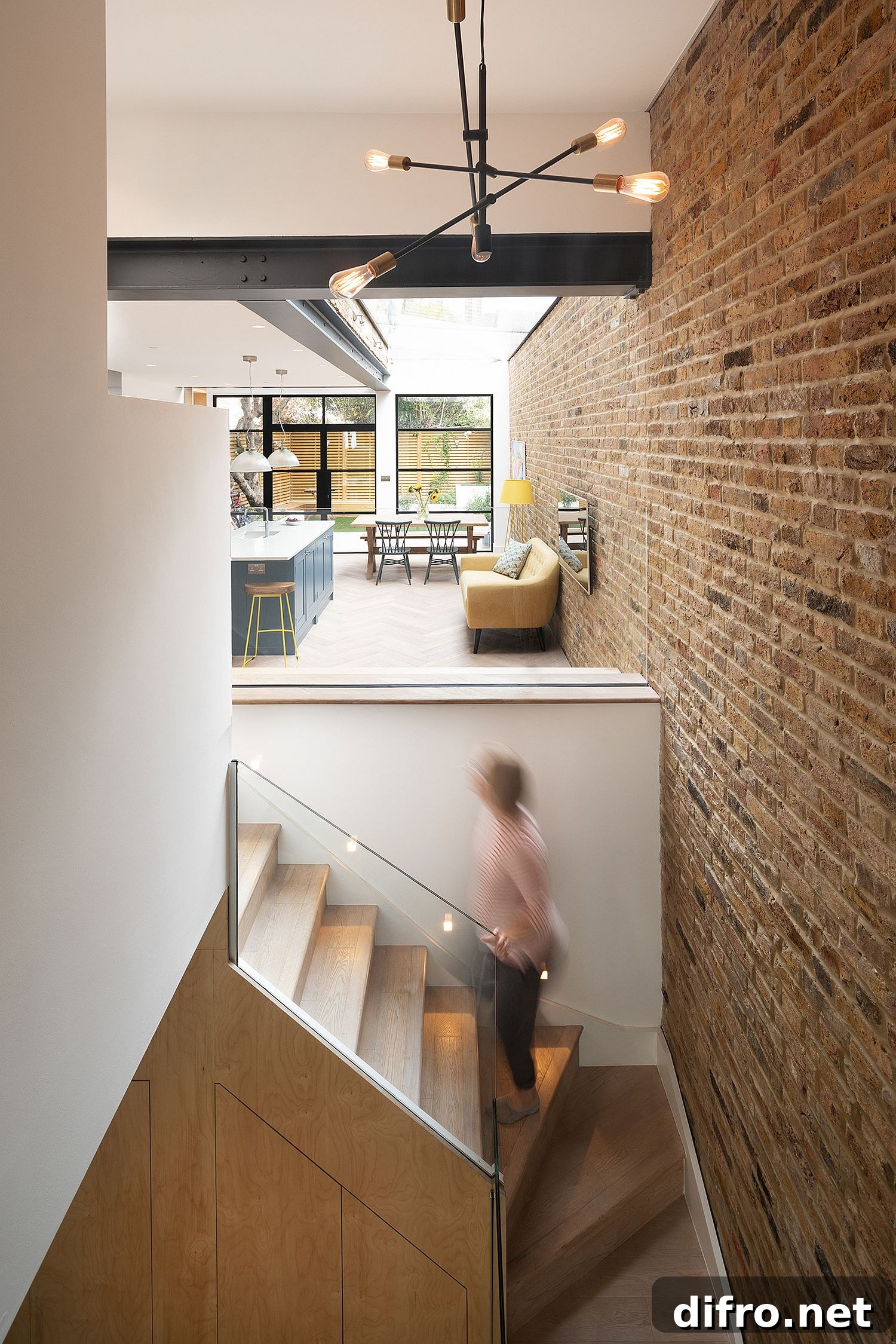 Newly positioned stairway brings more space to the interior of the house