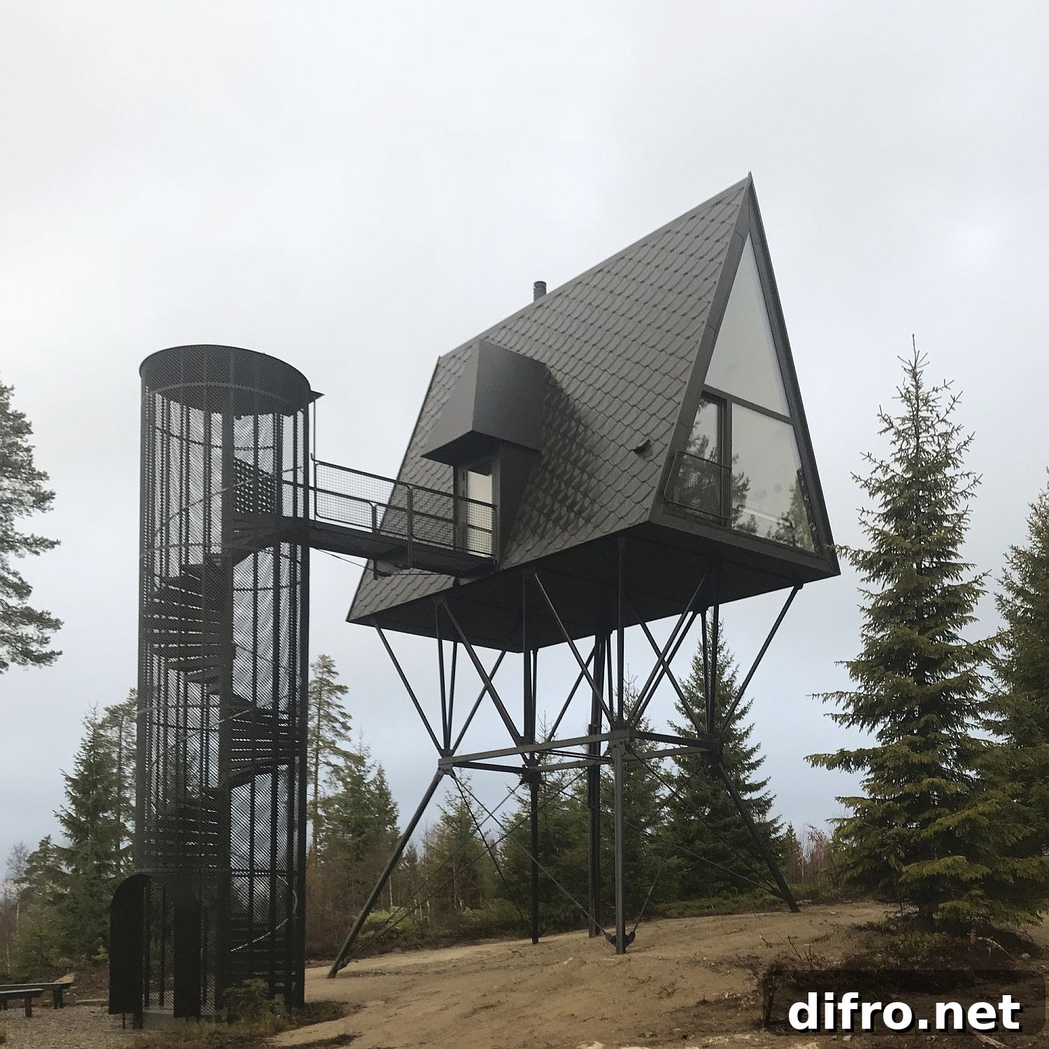 PAN cabin exterior in forest, elevated on steel stilts