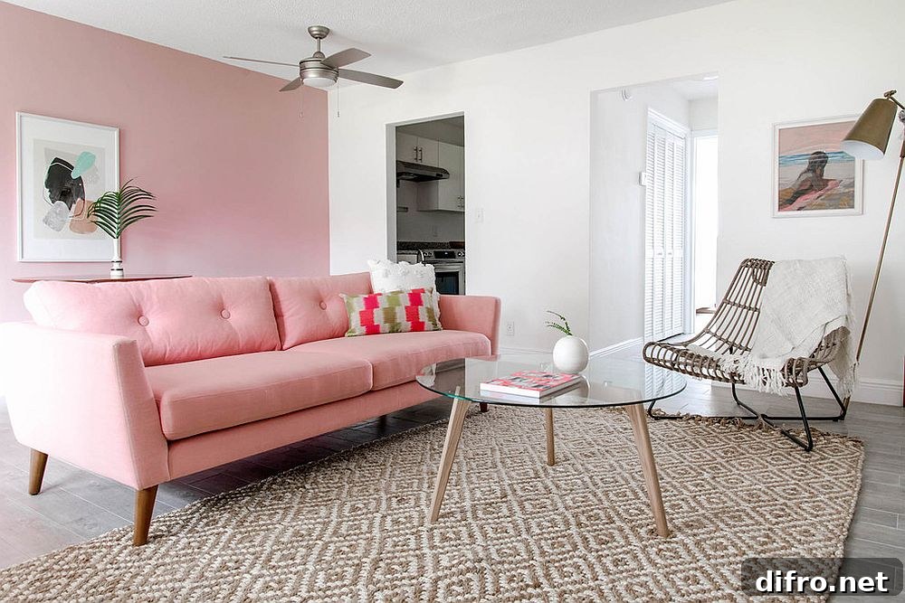 Midcentury living room with pink accent wall