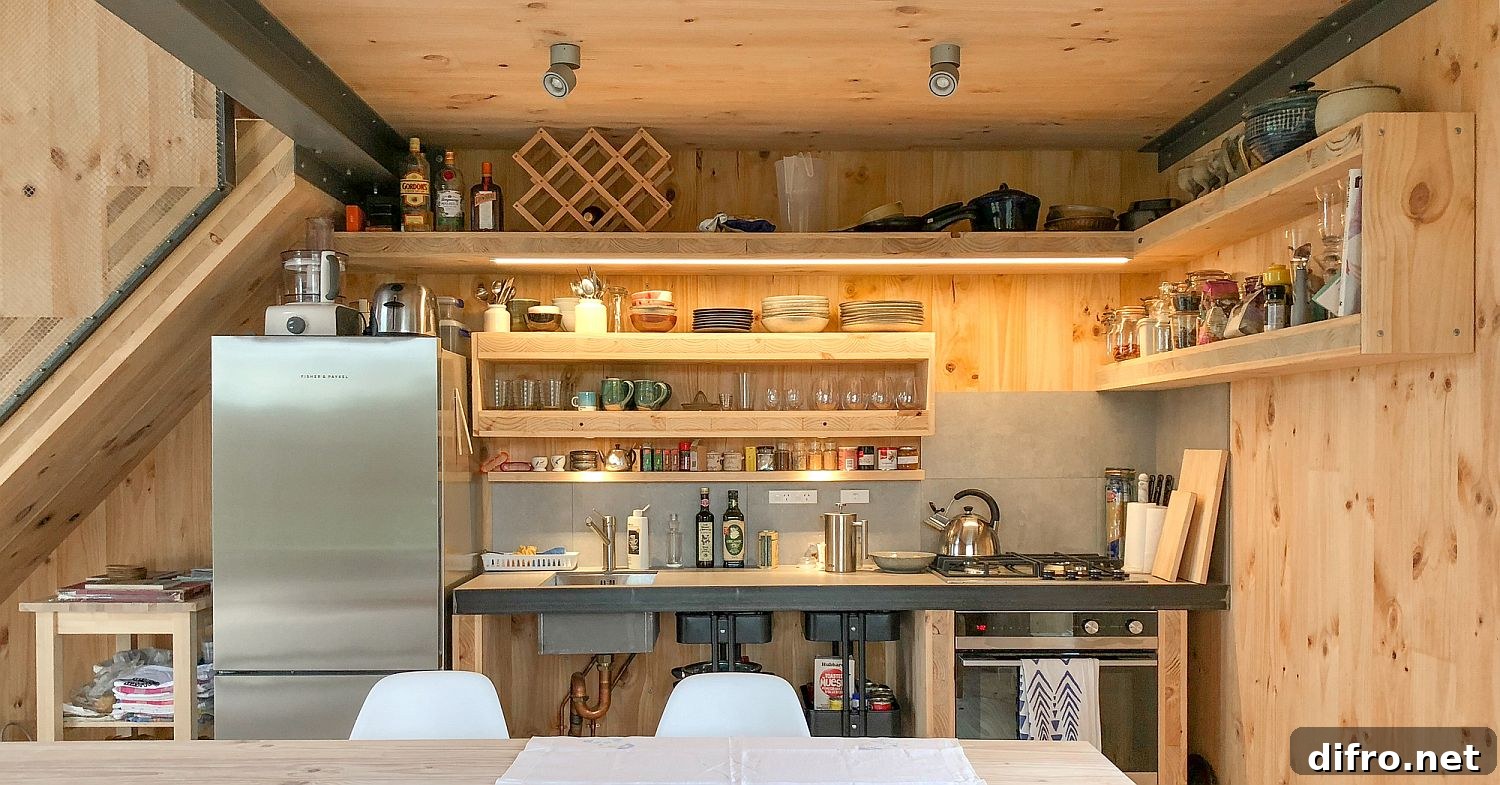 Cross-laminated timber panels shape the cozy interior of the tiny cabin retreat