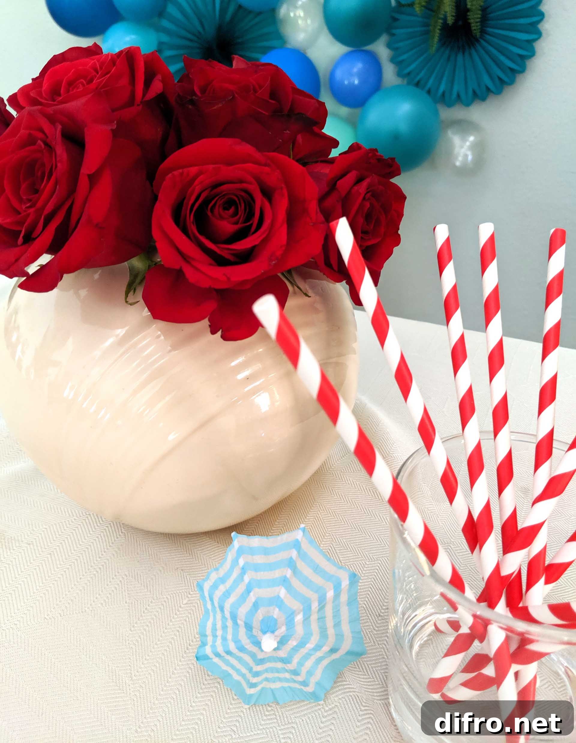 Red rose centerpiece on party table