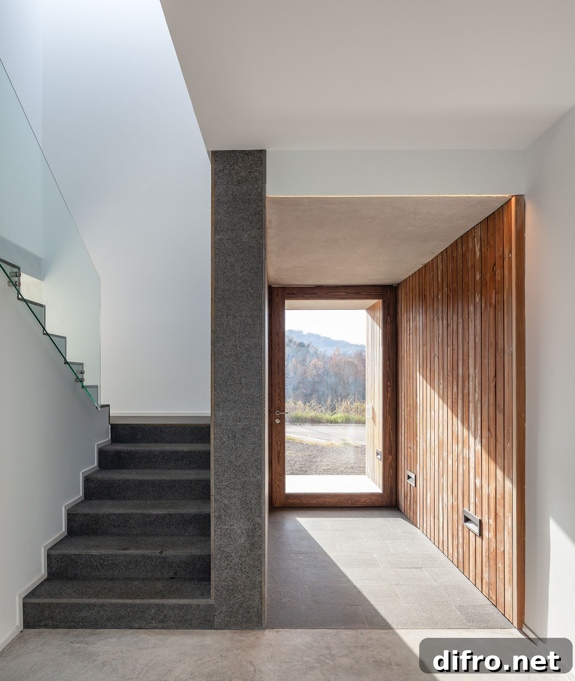 Minimal and modern entry to the home in Olot, Spain
