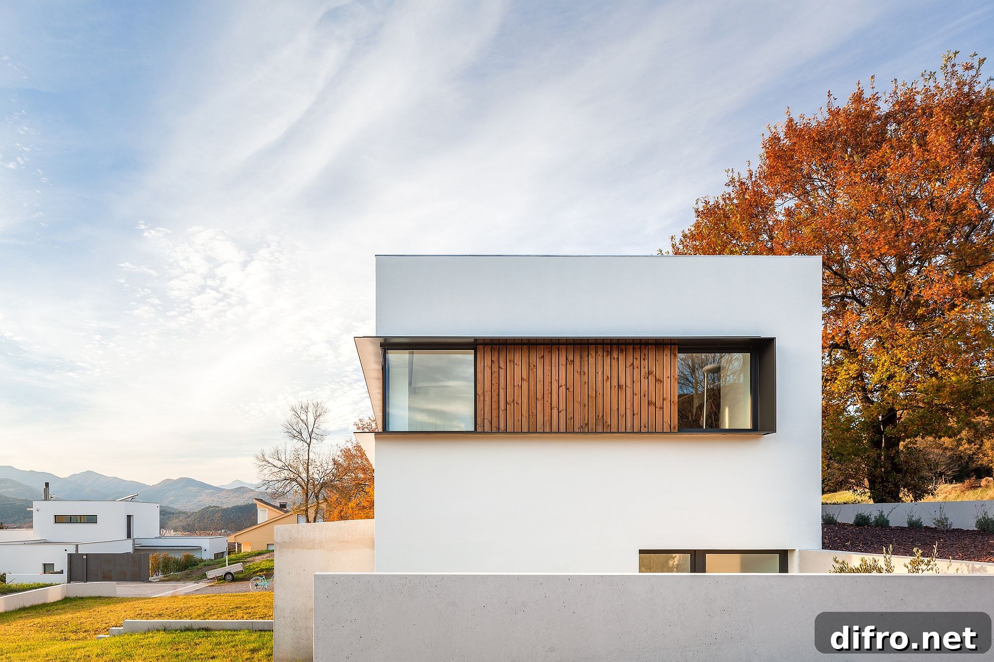 Wooden blinds and slats provide privacy for the upper level