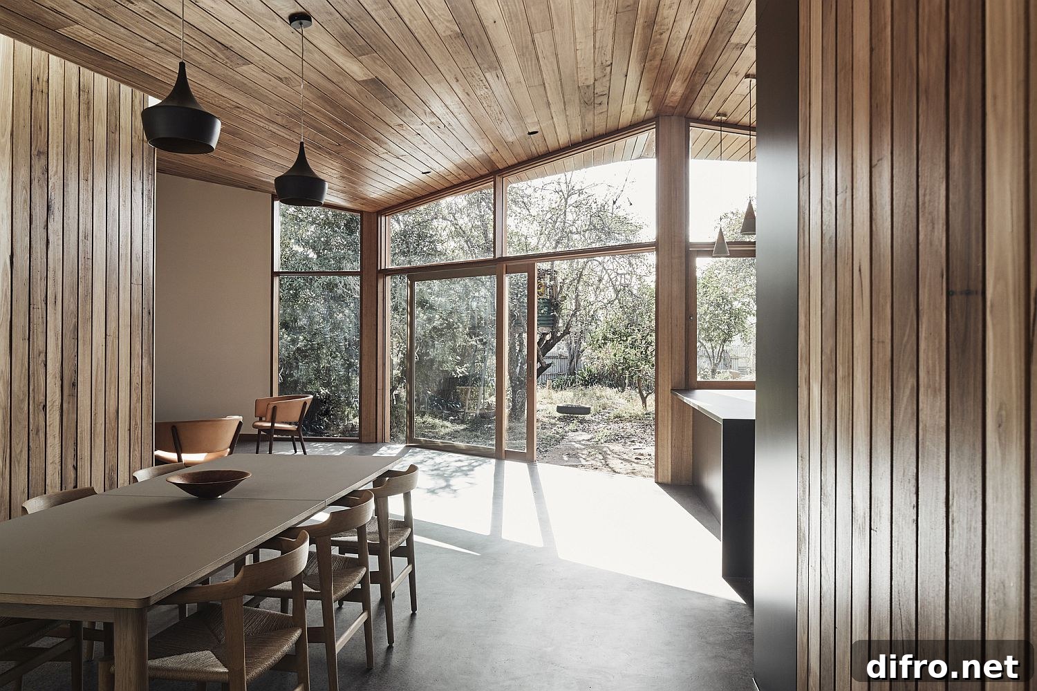 Wood-clad walls and ceiling add warmth