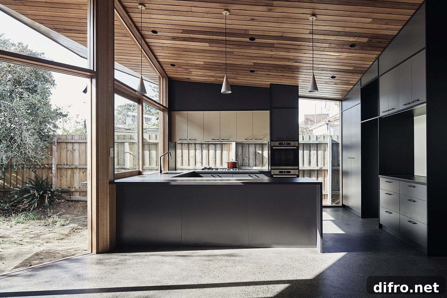 Gray kitchen opening to outdoors