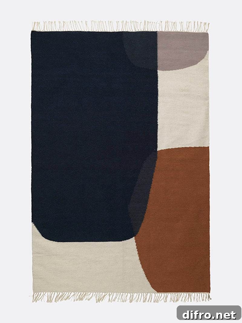 Minimalist kelim rug with overlapping geometric forms in muted hues