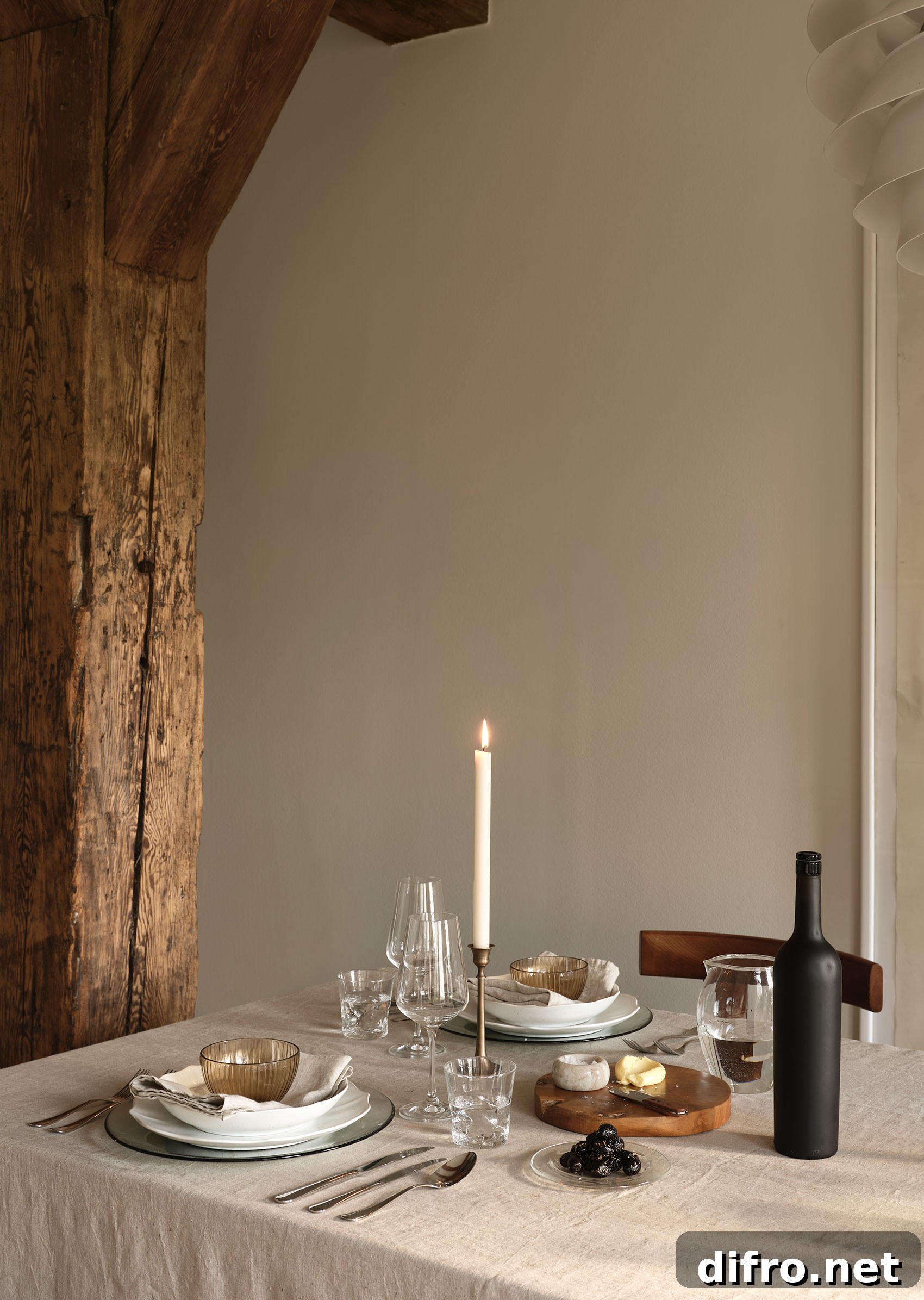 Washed linen tablecloth styled for an autumn table setting
