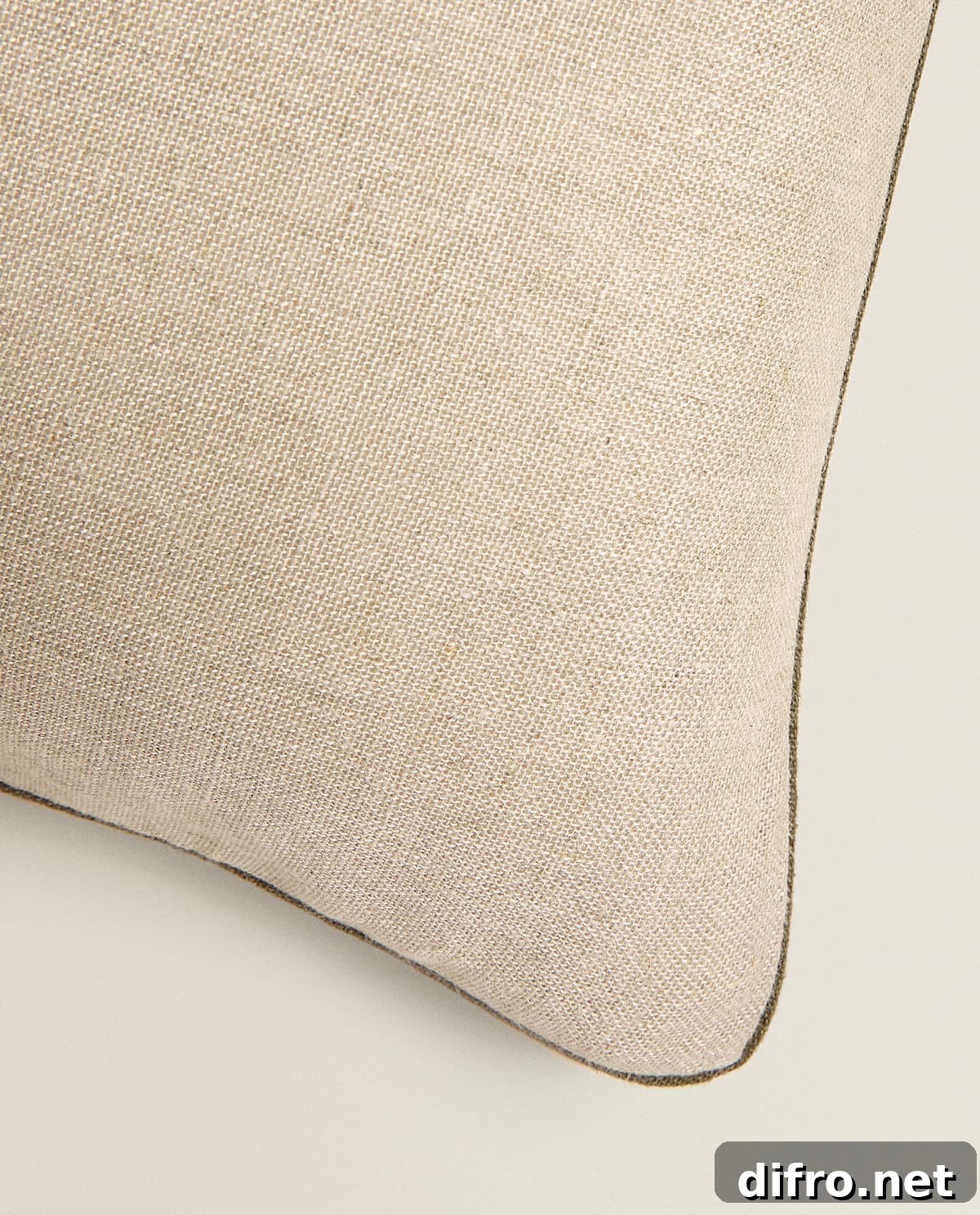 Washed linen throw pillow in a soft neutral tone
