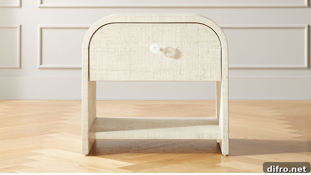 Textured linen nightstand with a lacquered finish and clear hardware