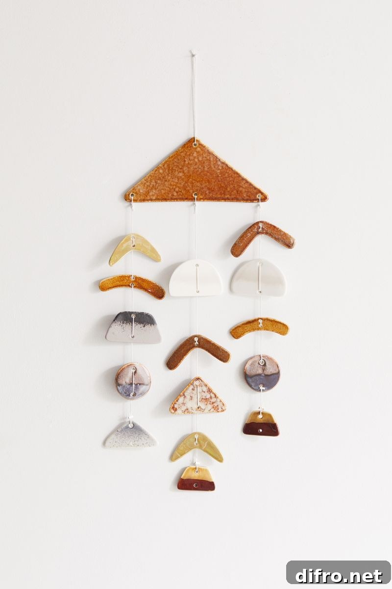 Rounded ceramic wall hanging with earthy glaze