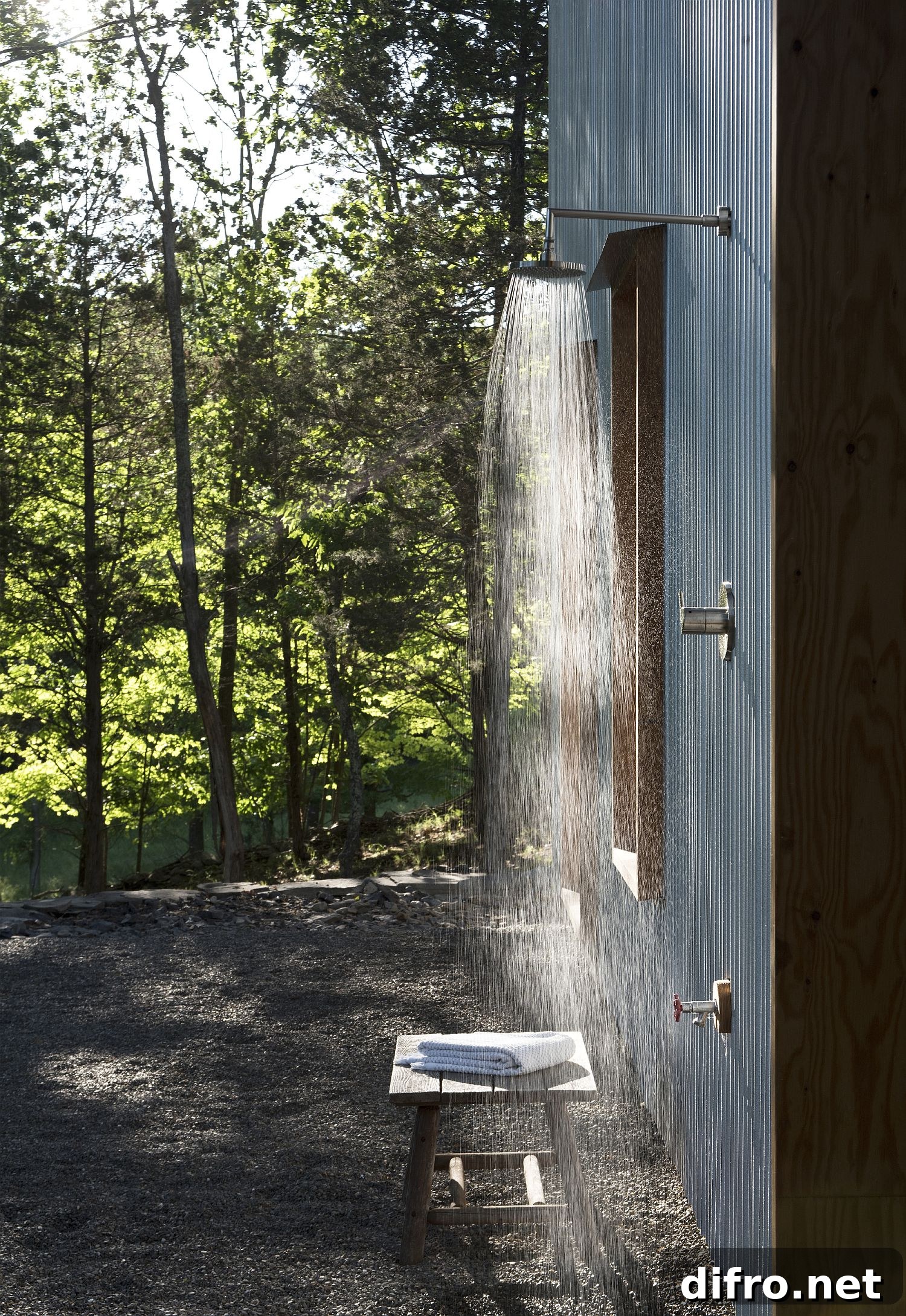 Outdoor shower zone surrounded by greenery