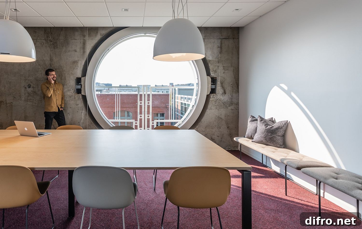 Circular windows contrasting with concrete walls
