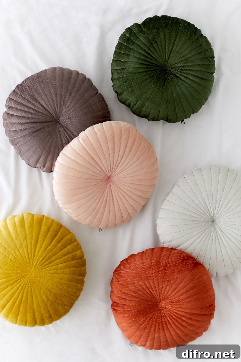 Round scalloped velvet pillows