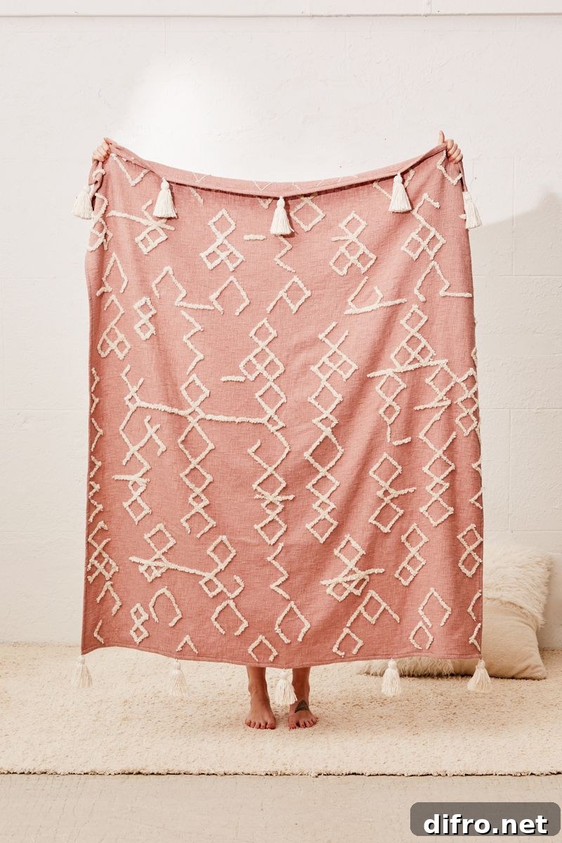 Tasseled throw blanket with texture