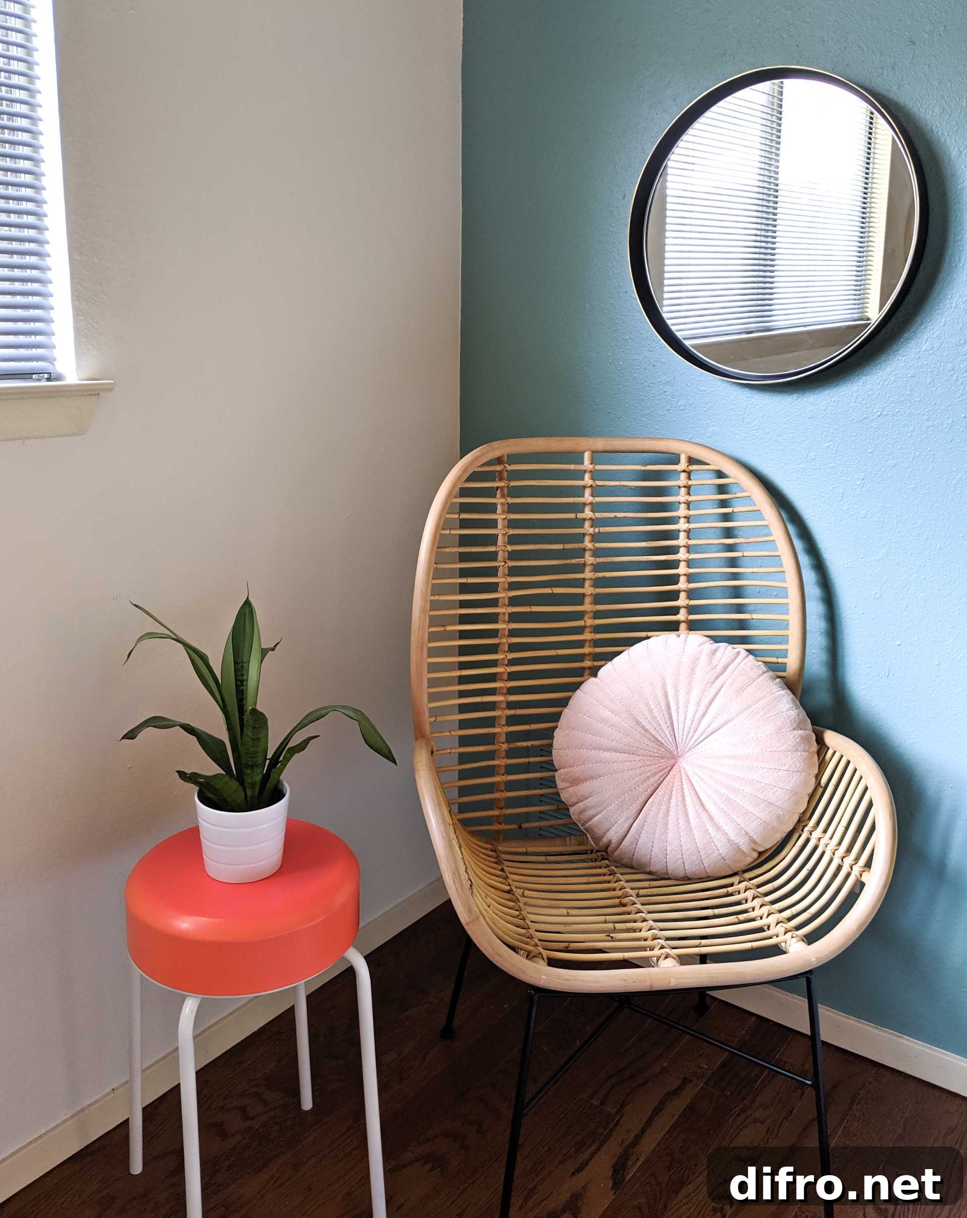 Rattan chair with a scalloped pillow
