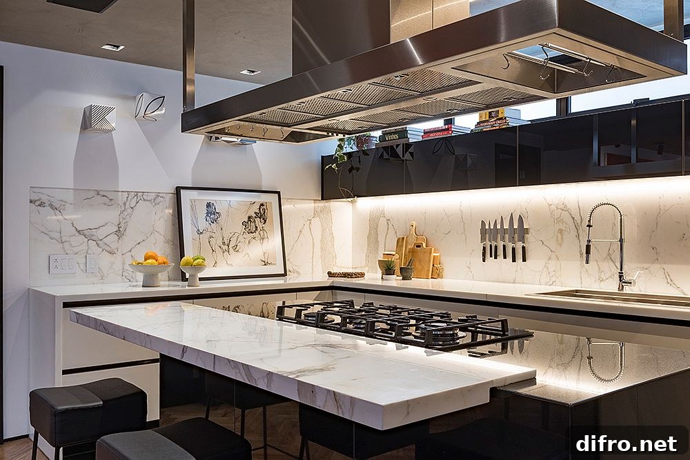 Brilliant blend of polished black and white stone finishes in the kitchen