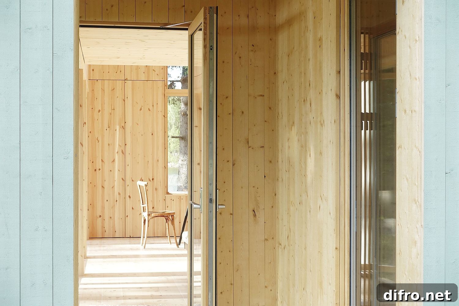 Minimal wooden cabin with windows