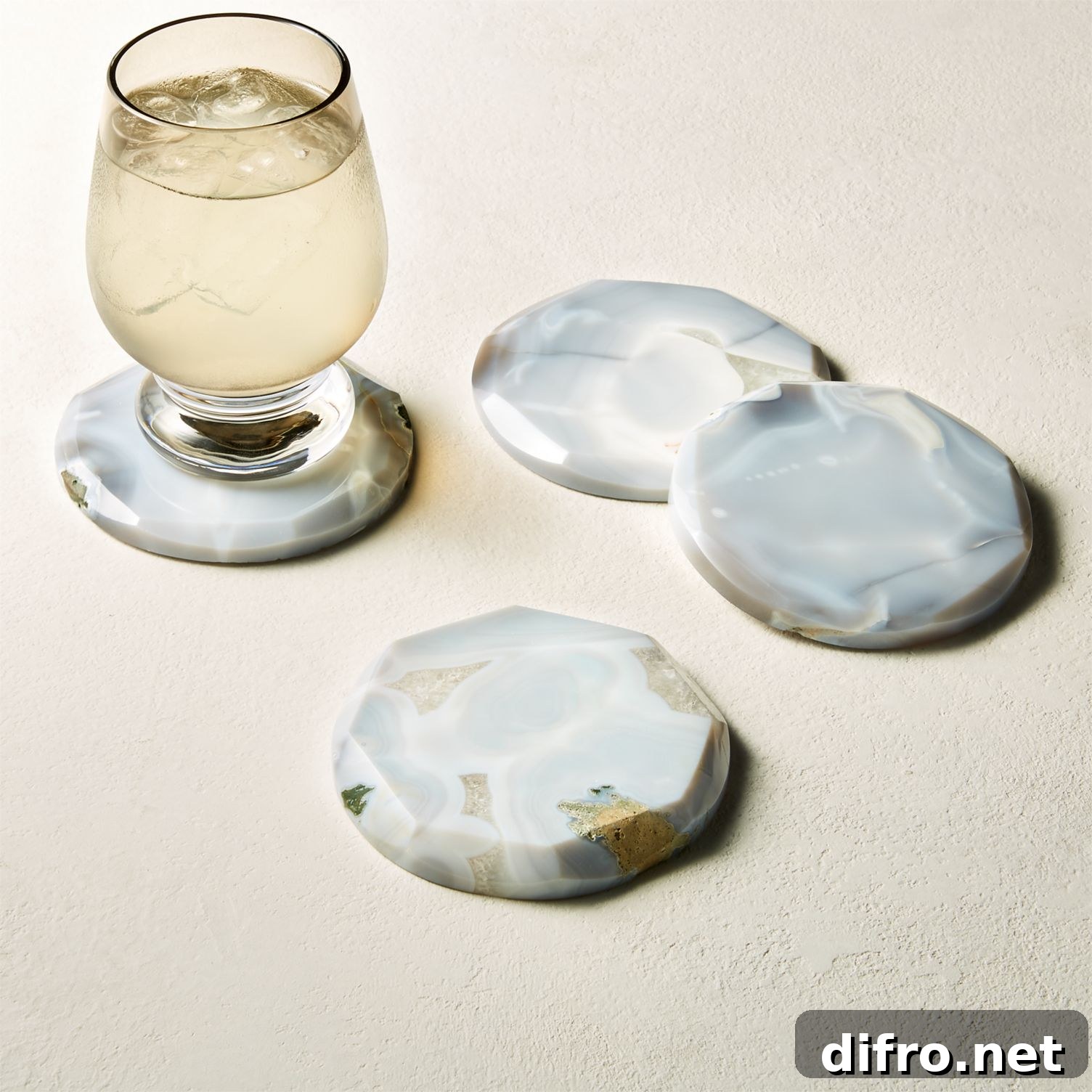 Set of four grey agate coasters with faceted edges
