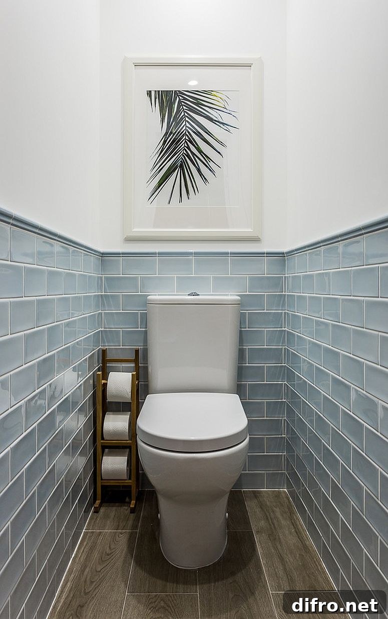 Bluish gray tiles in coastal powder room