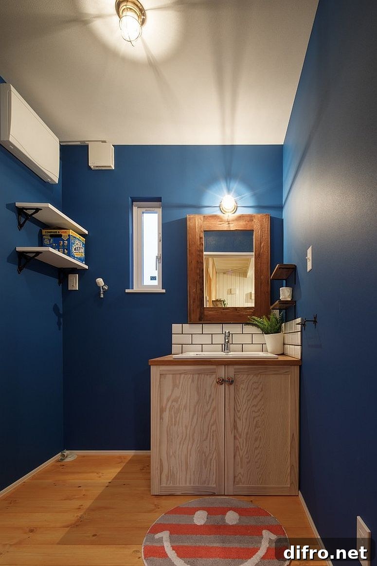 Navy blue coastal powder room