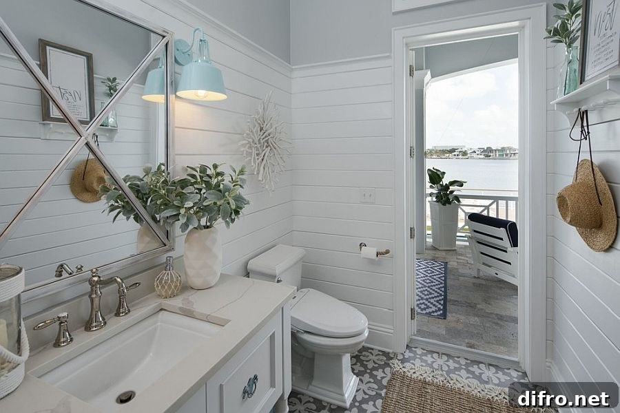 Light-filled white powder room connected to outdoors