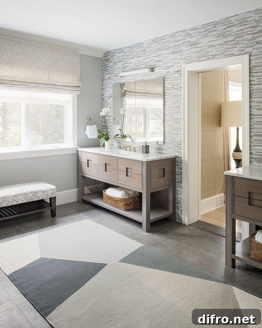 Gray and white bathroom with light wood accents