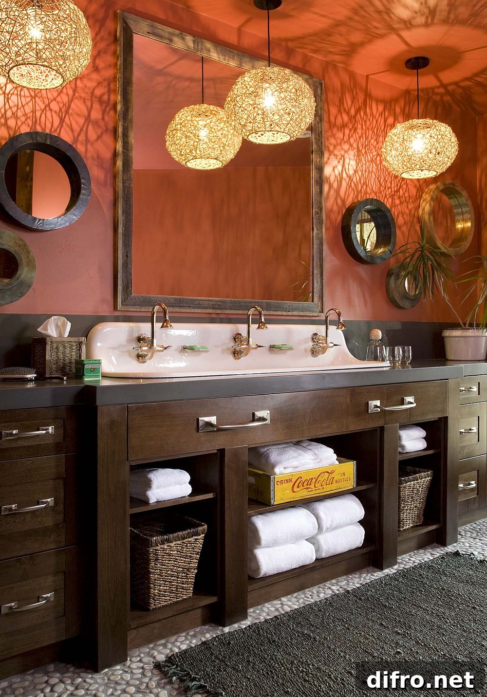 Bathroom in orange enhanced by lighting
