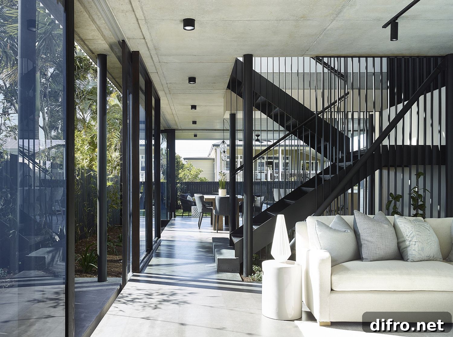 Open-plan living area with glass walls